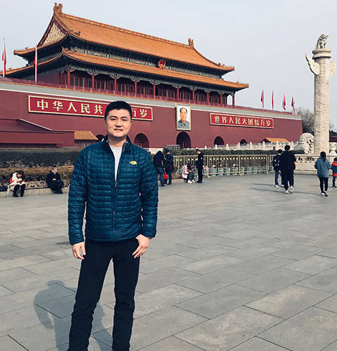 Peng visits Tiananmen Square on a business trip to Beijing.