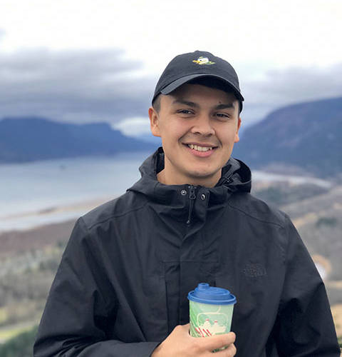 Traven visiting Vista House in the Columbia River Gorge National Scenic Area in 2018.