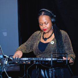 Carmen “Spindiego” Berkley deejaying at the National Coalition on Black Civic Participation’s National Conference. Photo credit: Sam Johnson Photography