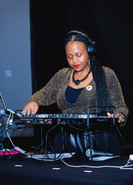 Carmen “Spindiego” Berkley deejaying at the National Coalition on Black Civic Participation’s National Conference. Photo credit: Sam Johnson Photography